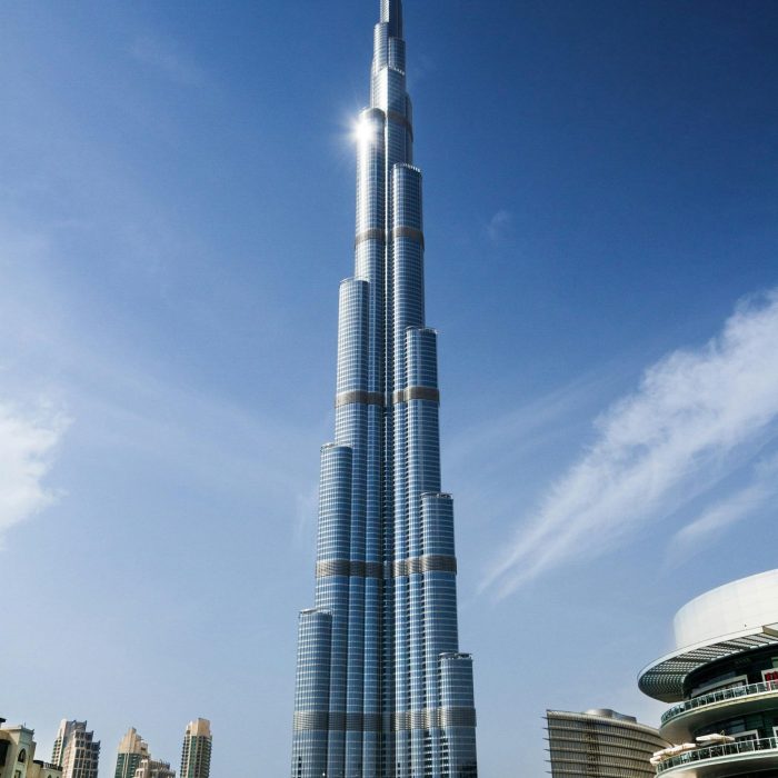 Stunning Daytime View Of Burj Khalifa Against A Clear Blue Sky In Dubai.