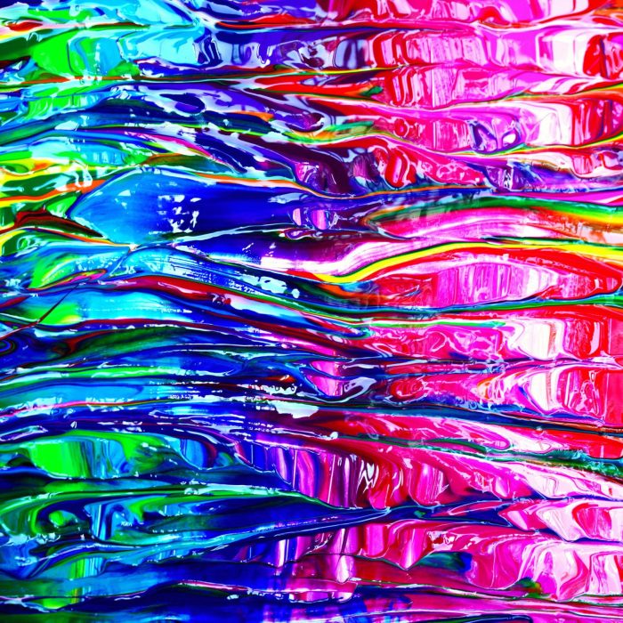 Colorful And Abstract Paint Texture With Vibrant Rainbow Hues.