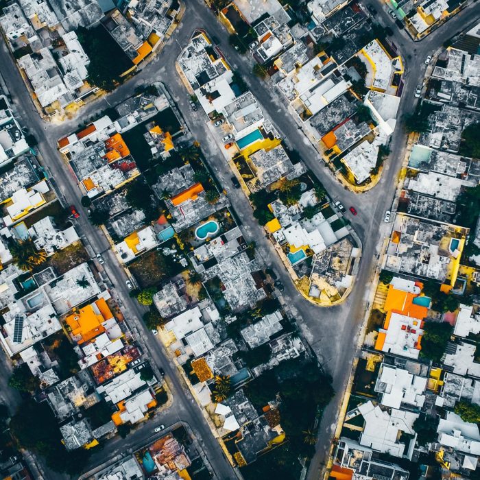 Vibrant Aerial Cityscape Of Mérida, Mexico, Showcasing Urban Architecture And Winding Streets.