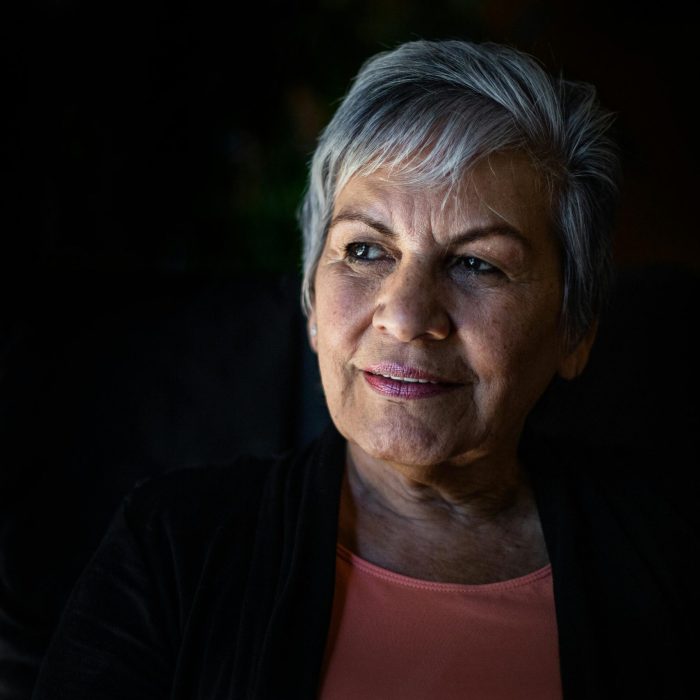 Elderly Woman With Gray Hair Looking Thoughtfully, Showcasing Wisdom And Grace.